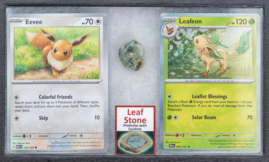 Two trading cards featuring Eevee and Leafeon, a stone, and a card with 'Leaf Stone' on a gray background.