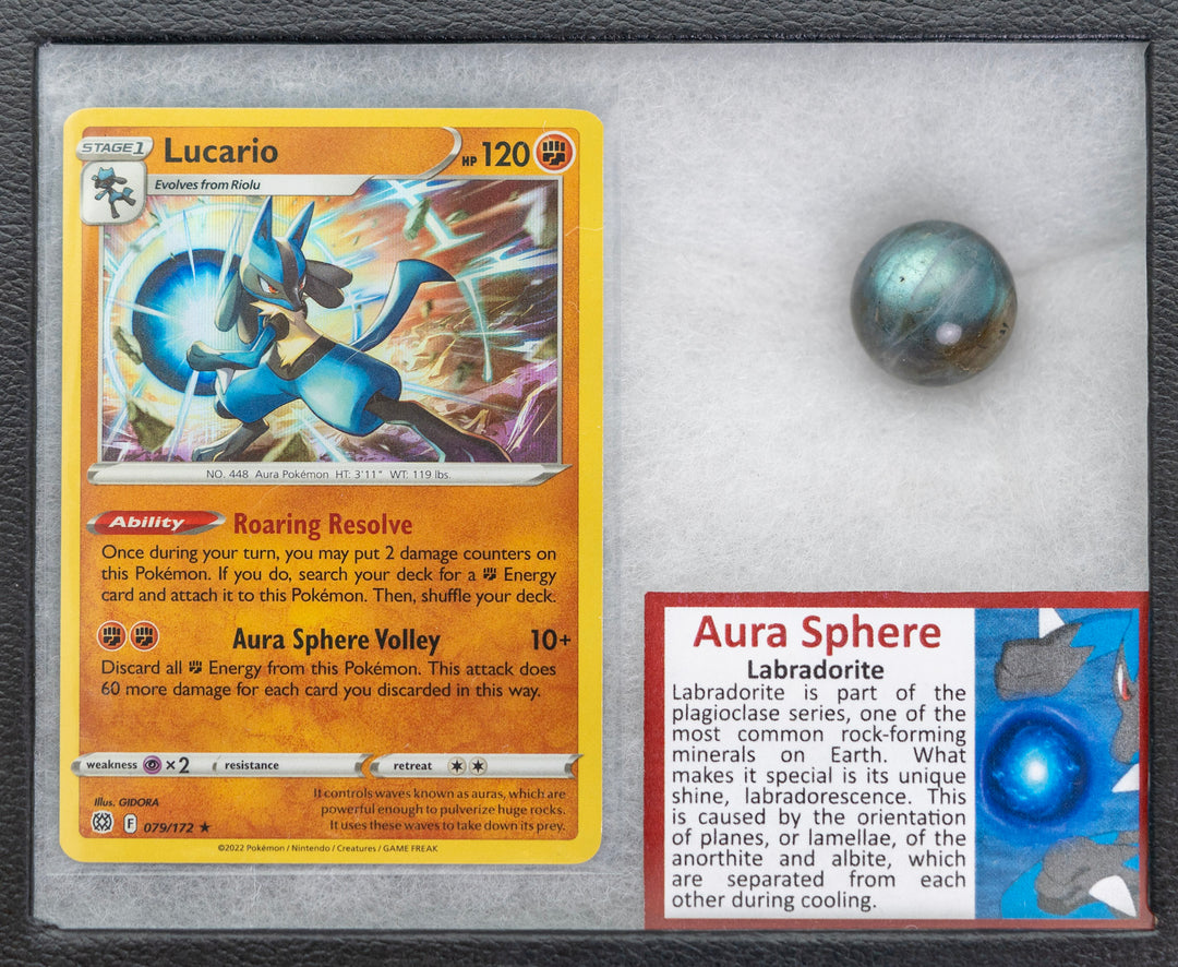 Pokémon trading card featuring Lucario with a Pokémon ball on a gray background